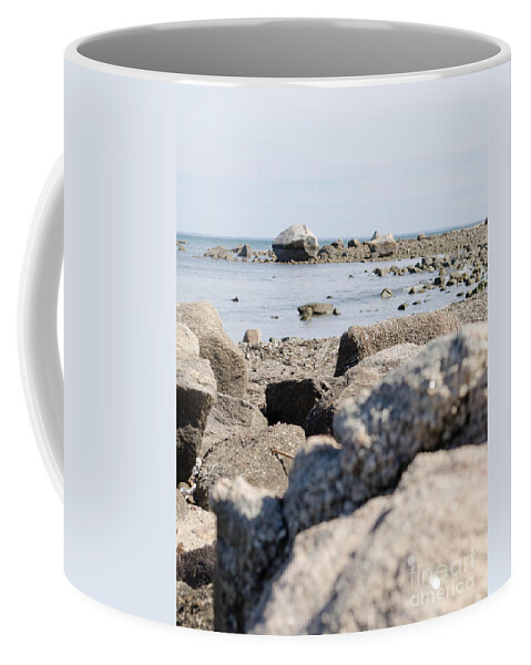 Sea Coffee Mug featuring the photograph Rocks on the beach by Andrea Anderegg