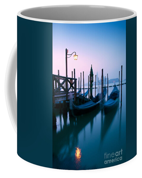 Gondolas Coffee Mug featuring the photograph Row of gondolas at sunrise in Venice - Italy by Matteo Colombo