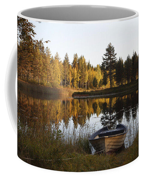 Anundsjoe Coffee Mug featuring the photograph Rowing boat at a lake - available for licensing by Ulrich Kunst And Bettina Scheidulin