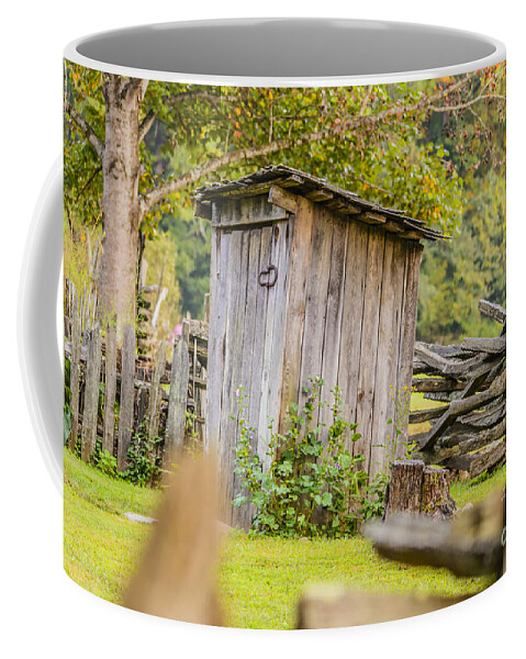 North Carolina Coffee Mug featuring the photograph Rustic Fence and Outhouse by Elvis Vaughn