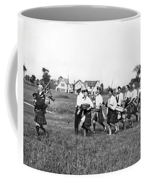 1920s Coffee Mug featuring the photograph Scottish Golfers With Bagpipe by Underwood Archives