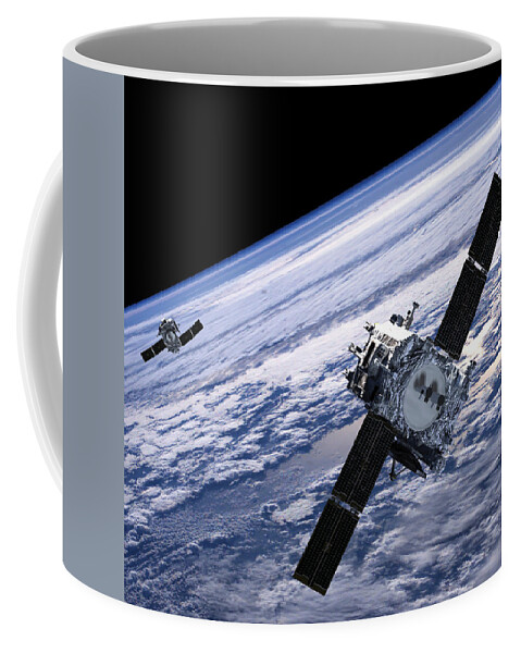 No People; Horizontal; Outdoors; Day; Elevated View; Mid-air; Flying; Two Objects; Technology; Satellite; Planet Earth; Astronomy; Space Exploration; Exploration; Space Coffee Mug featuring the photograph Solar Terrestrial Relations Observatory satellites by Anonymous