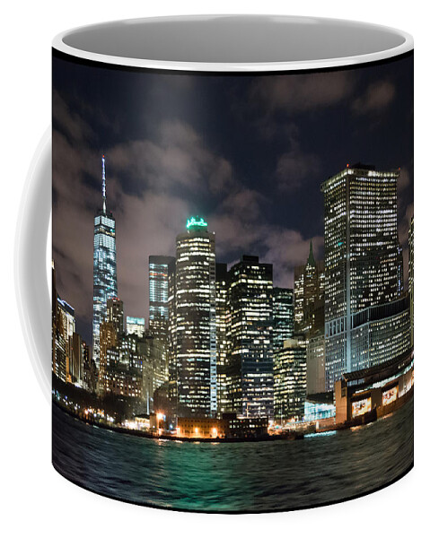 View Of South Ferry Manhattan New York City At Night From The Water Coffee Mug featuring the photograph South Ferry Manhattan at Night by Kenneth Cole