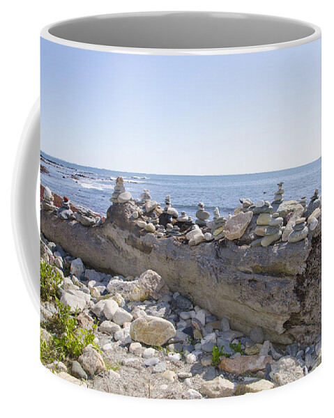 Stones Coffee Mug featuring the photograph Stones on a Driftwood Log by Bill Cannon