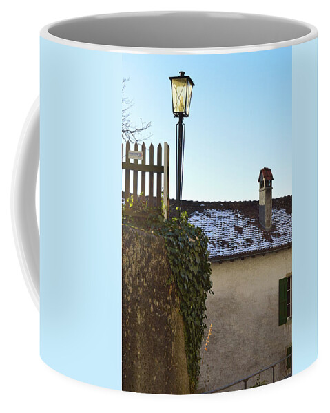 Buildings Coffee Mug featuring the photograph Street lamp at the Castle by Felicia Tica