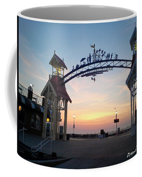 Sunrise Coffee Mug featuring the photograph Sunrise at the Ocean City Arch by Robert Banach