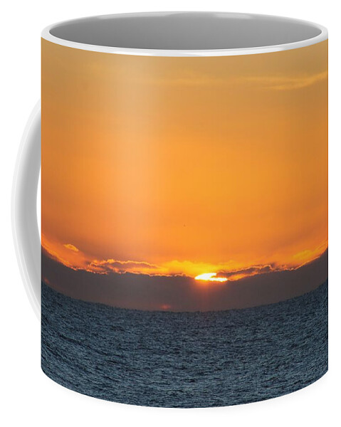 Nature Coffee Mug featuring the photograph Sunrise Over A Cloudy Horizon by Robert Banach