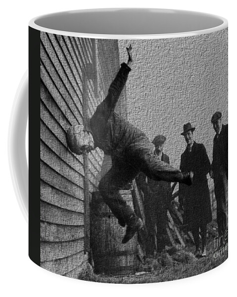 Testing Coffee Mug featuring the photograph Testing football helmets in 1912 oucHHHHH by Vintage Collectables