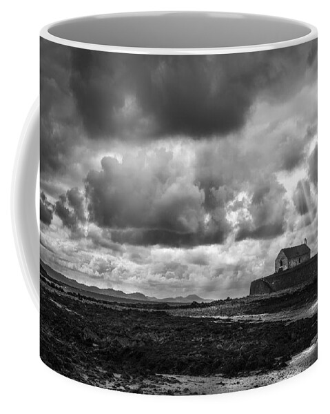 St Cwyfan Coffee Mug featuring the photograph The Church in the Sea by Mal Bray