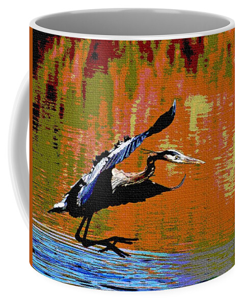 The Great Blue Heron Coffee Mug featuring the photograph The Great Blue Heron Jumps To Flight by Tom Janca