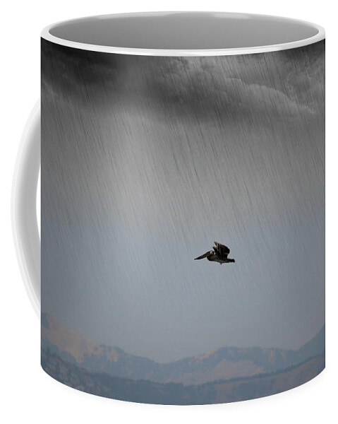 Pelican Coffee Mug featuring the photograph The Persevering Pelican by Spencer Hughes