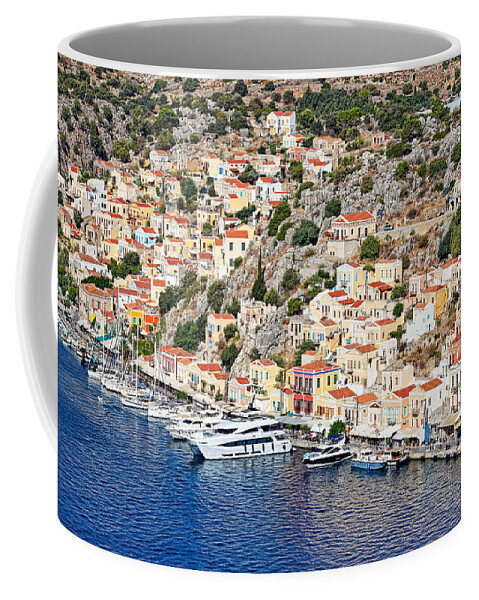 Aegean Coffee Mug featuring the photograph The port of Symi - Greece by Constantinos Iliopoulos