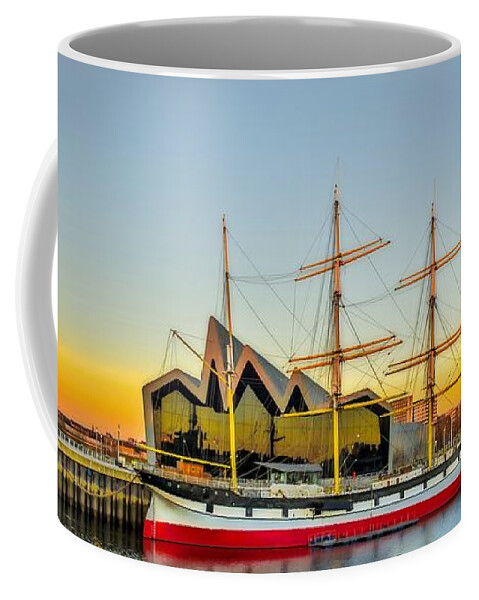 https://render.fineartamerica.com/images/rendered/default/frontright/mug/images-medium-5/the-tall-ship-glenlee-at-riverside-museum-glasgow-tylie-duff.jpg?&targetx=0&targety=-33&imagewidth=800&imageheight=400&modelwidth=800&modelheight=333&backgroundcolor=8399A6&orientation=0&producttype=coffeemug-11