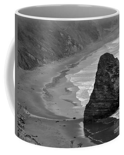 Beach Photographs Coffee Mug featuring the photograph Towering Rock by Kirt Tisdale