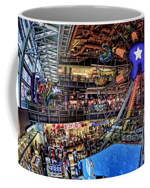 Colorful Coffee Mug featuring the photograph Toys Wheel by Tina Baxter