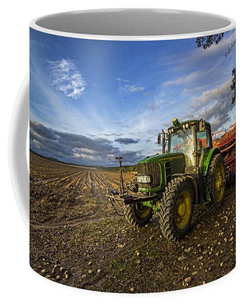 Potato Farm Coffee Mug featuring the photograph Tractor on a Potato Farm by Robert Seifert