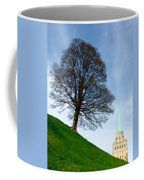 Canon Coffee Mug featuring the photograph Tree on a Hill by Jeremy Hayden