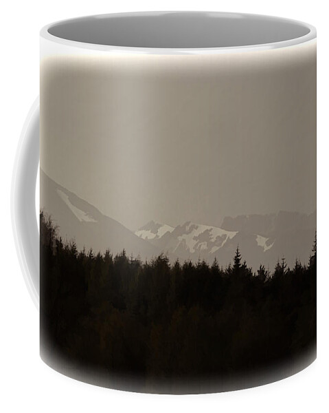 Blue Sky Coffee Mug featuring the photograph Treeline with ice capped mountains in the Scottish Highlands by Ashish Agarwal