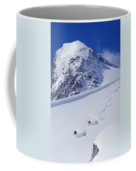 Action Coffee Mug featuring the photograph Two Young Men Skiing Untracked Powder by Henry Georgi Photography Inc