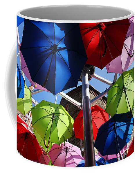 Umbrella Coffee Mug featuring the photograph Umbrellas in the sky by Nicky Jameson