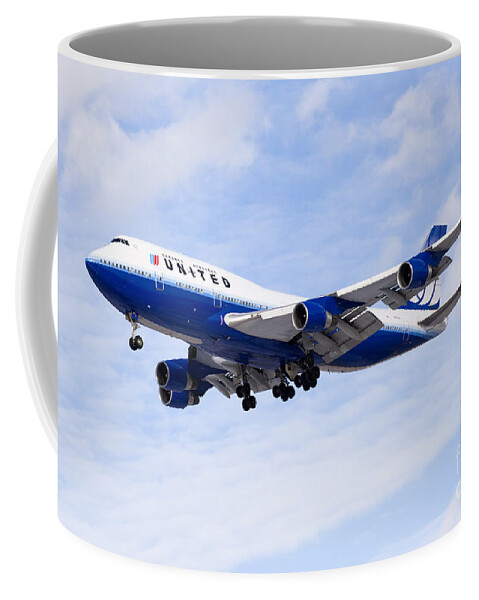 747 Coffee Mug featuring the photograph United Airlines Boeing 747 Airplane Flying by Paul Velgos