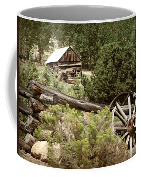 Cabin Coffee Mug featuring the photograph Wagon Wheel by KATIE Vigil