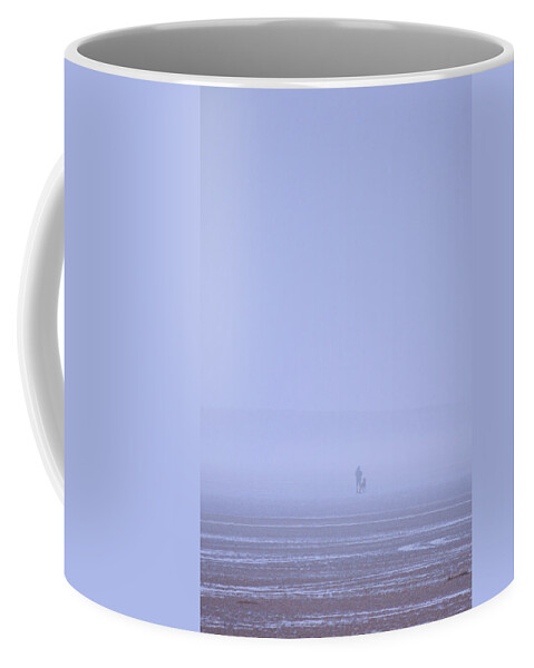 Walking Coffee Mug featuring the photograph Walking the dog in the mist by Spikey Mouse Photography