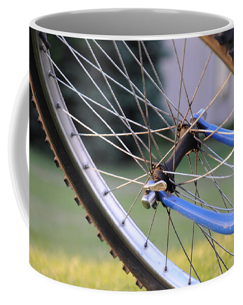Bicycle Wheel Bike Tire Coffee Mug featuring the photograph Wheeling by Susie Rieple