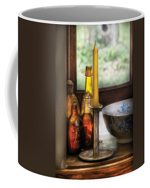 Savad Coffee Mug featuring the photograph Wine - Nestled in a corner of a window sill by Mike Savad
