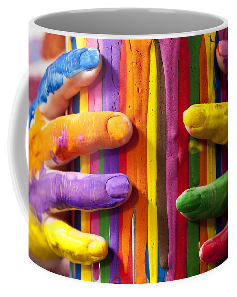 Acrylic Paint Coffee Mug featuring the photograph Woman holding painted can with painted fingers by Jim Corwin