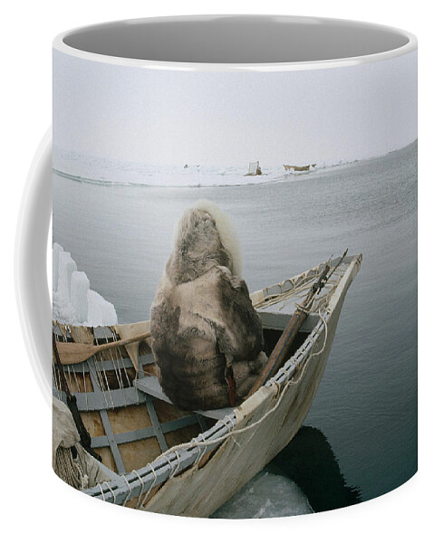 00112350 Coffee Mug featuring the photograph Inuit Hunter In Traditional Clothes #1 by Flip Nicklin