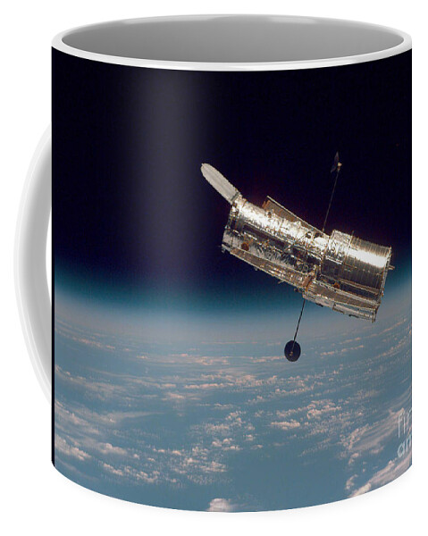Hubble Coffee Mug featuring the photograph Hubble Space Telescope #7 by Nasa