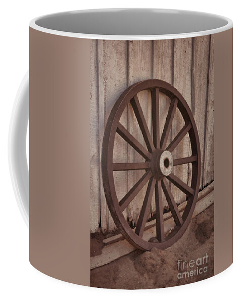Old Coffee Mug featuring the photograph An Old Wagon Wheel by Donna Greene