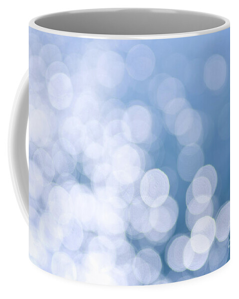 Blue Coffee Mug featuring the photograph Blue water and sunshine abstract by Elena Elisseeva