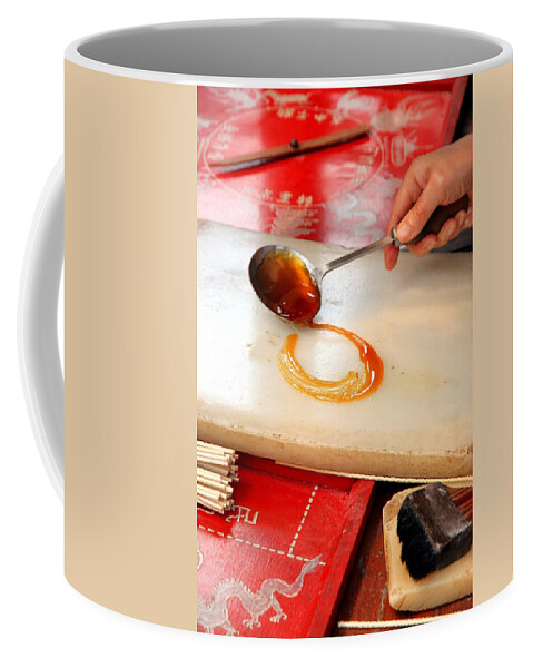 Food Coffee Mug featuring the photograph Candy Making by Valentino Visentini