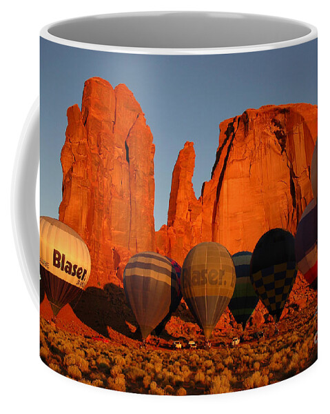 Hot Air Balloons Coffee Mug featuring the photograph Dawn Flight in Monument Valley by Vivian Christopher