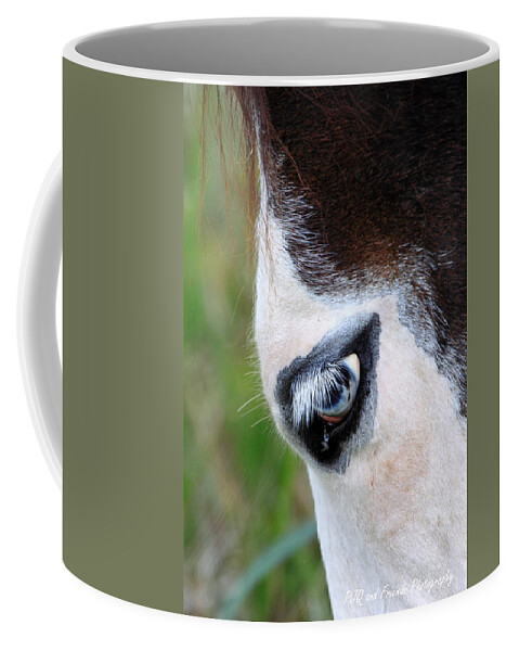  Coffee Mug featuring the photograph 'Eye of Ghostface' by PJQandFriends Photography