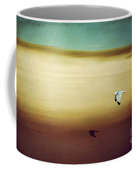 Seagull Coffee Mug featuring the photograph Flight Over The Beach by Hannes Cmarits