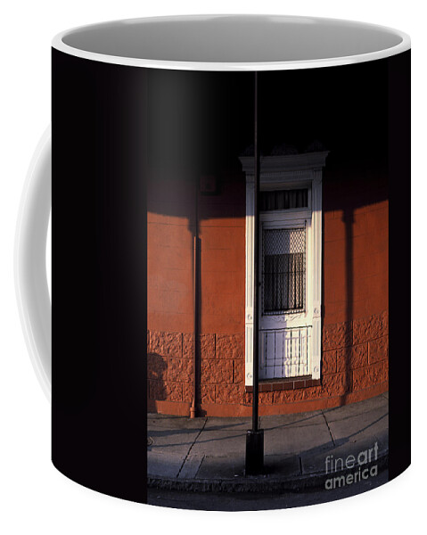 French Quarter Coffee Mug featuring the photograph French Quarter door and shadows New Orleans by Mike Nellums