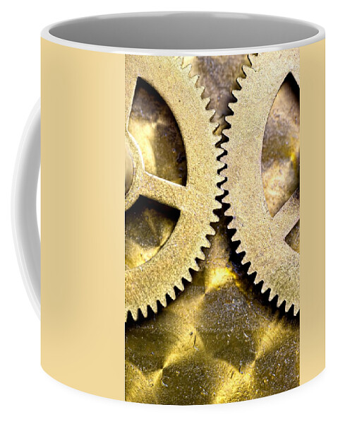 John Coffee Mug featuring the photograph Gears From Inside A Wind-up Clock by John Short