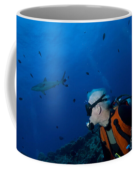 English Reef Coffee Mug featuring the photograph Gray Reef Shark With Diver, Papua New by Steve Jones