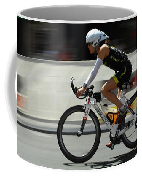Ironman Coffee Mug featuring the photograph Ironman 2012 Flying By by Bob Christopher