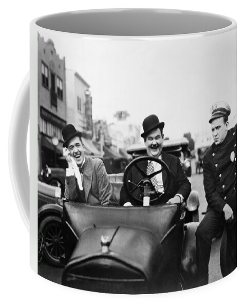 1920s Coffee Mug featuring the photograph Laurel And Hardy, 1928 by Granger