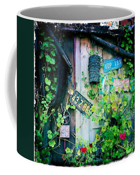 License Plate Coffee Mug featuring the photograph License plate wall by Nina Prommer