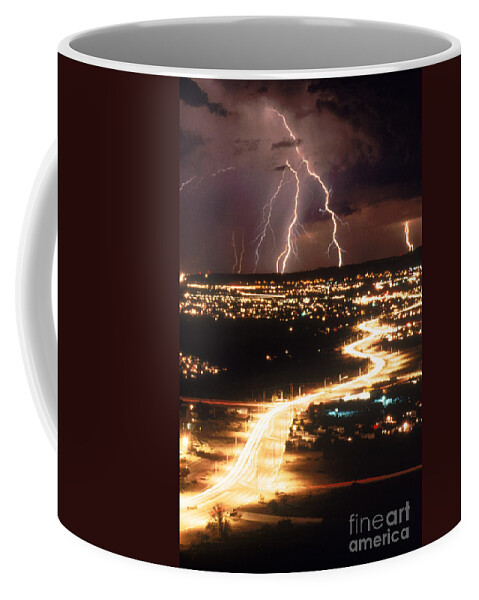 Meteorology Coffee Mug featuring the photograph Lightning Storm by Kent Wood and Photo Researchers
