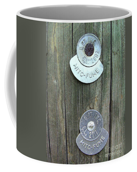 Mitc Fume Coffee Mug featuring the photograph MITC FUME Tags On Light Pole by Renee Trenholm