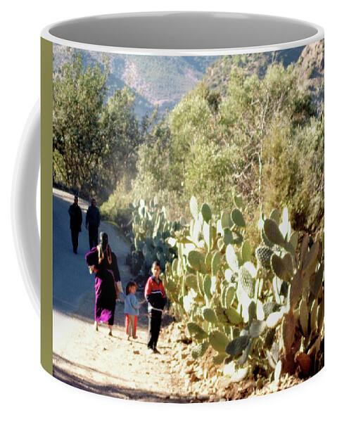 Travel Coffee Mug featuring the photograph Moroccan People and Cacti by Miki De Goodaboom