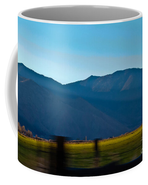 Passing By Coffee Mug featuring the photograph Passing By by Mitch Shindelbower