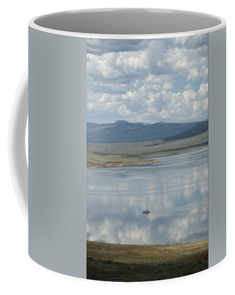 Eagle Nest Coffee Mug featuring the photograph Reflection Of Clouds On eagle Nest Lake by Ron Weathers