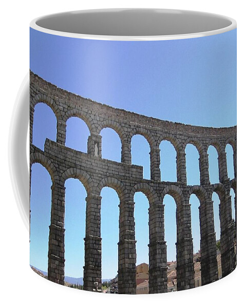 Segovia Coffee Mug featuring the photograph Segovia Ancient Roman Aqueduct Architectural Granite Stone Structure IX With Arches in Sky Spain by John Shiron